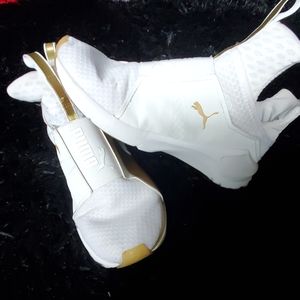 Gold and white puma